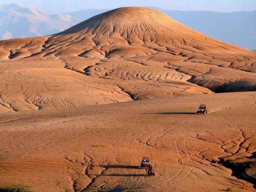 De Marrakech à Agafay : coucher de soleil, quad, chameau, dîner et spectacle de feu